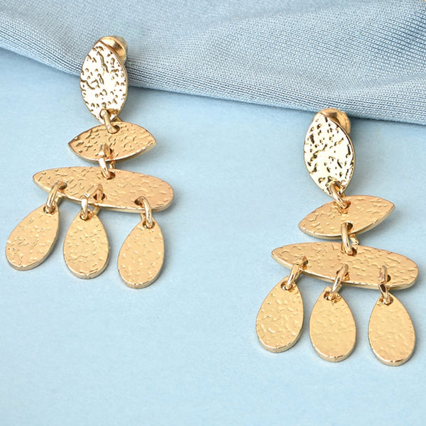 Gold earrings on a light blue fabric background. ToniQ jewellery is skin safe, nickel free, cadmium free, hypoallergenic, and lab tested for your comfort and trust.