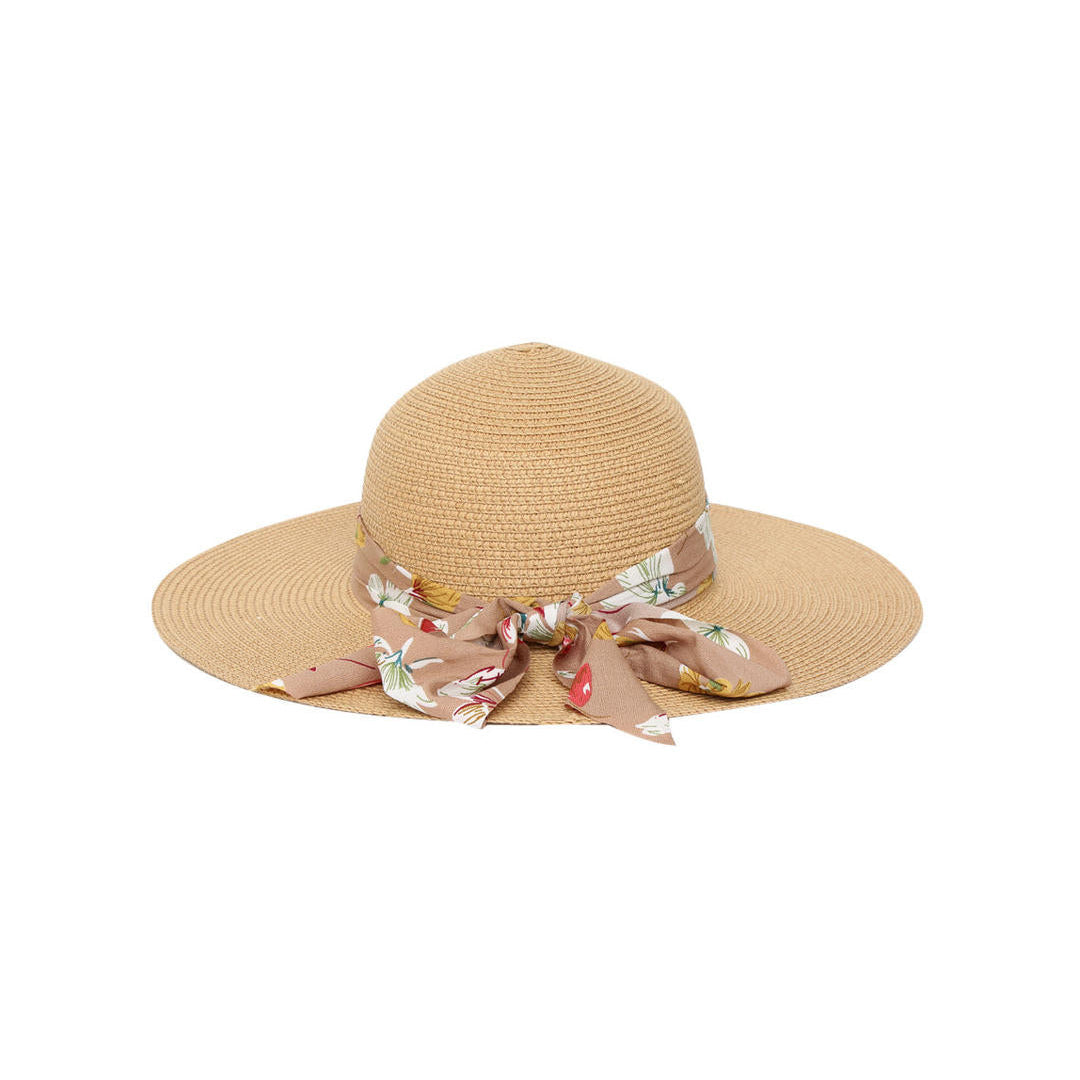 A beige beach hat with a soft brown multicolor floral printed scarf around the base.