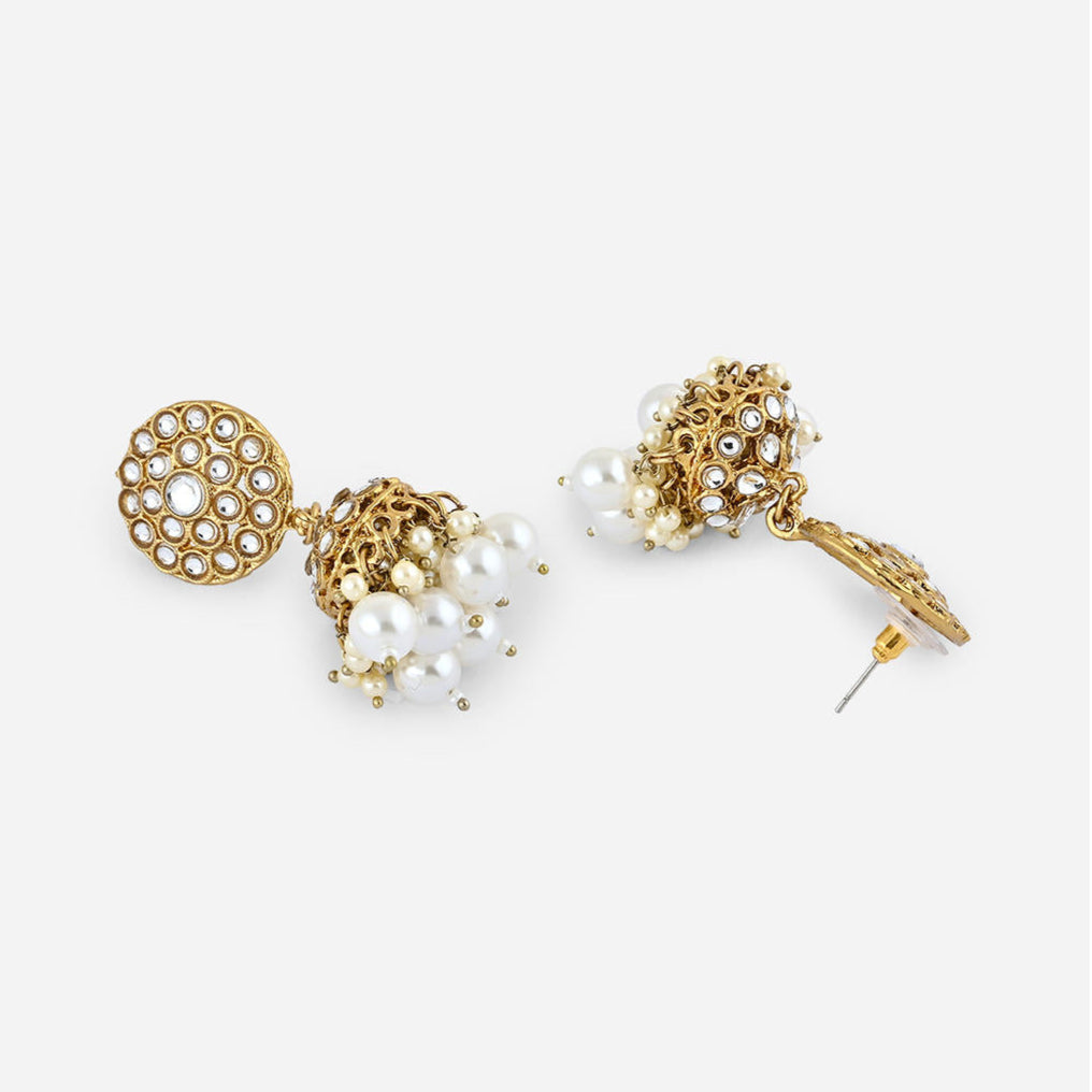a white pearl and gold statement earrings set