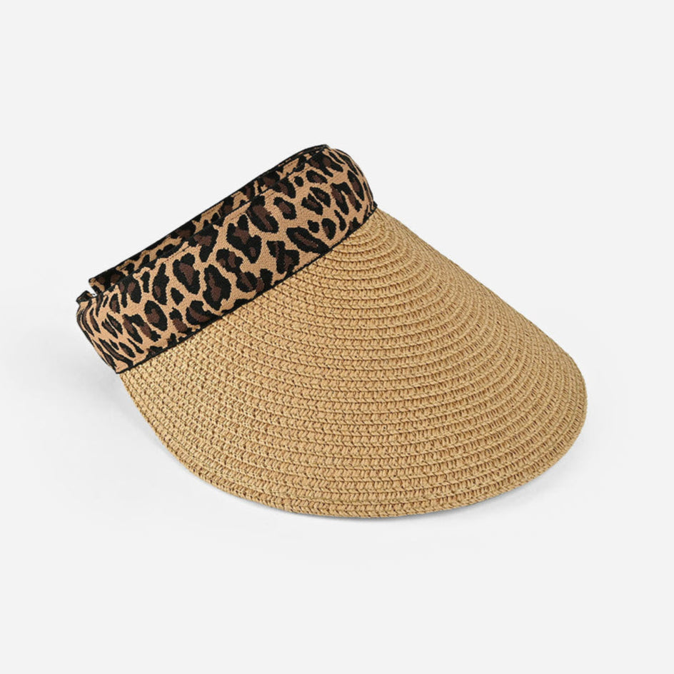 Beige visor hat with leopard print band on a white background