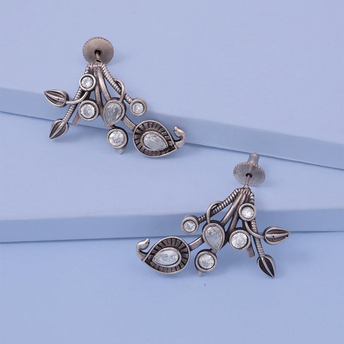 Intricate Oxidized Silver Stud Earrings with American Diamond Accents