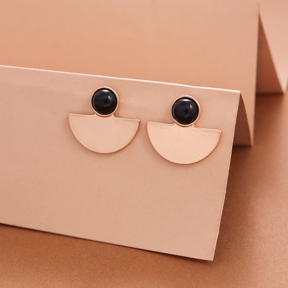 Modern Gold Half-Moon Stud Earrings with Black Cabochon