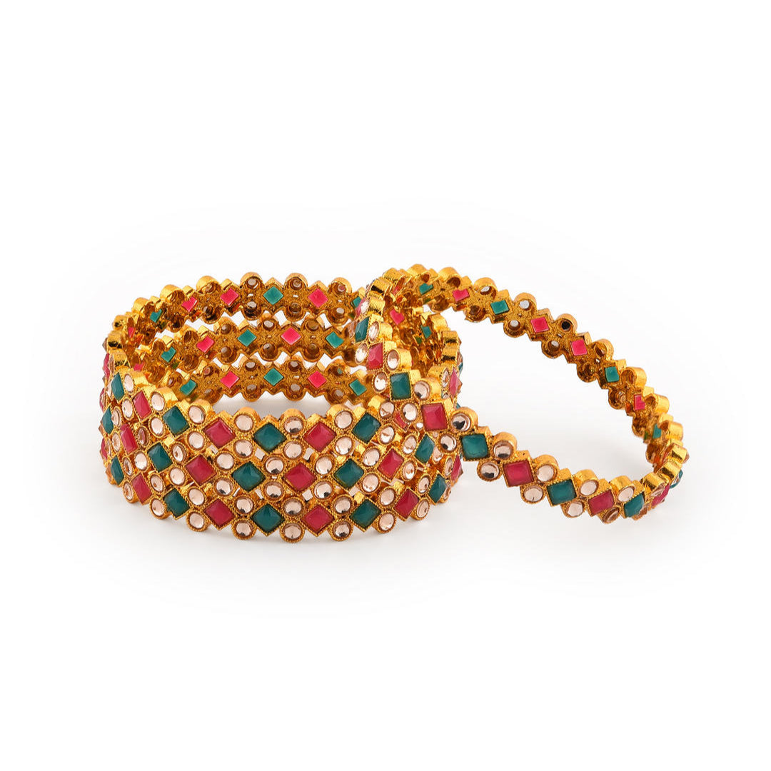 Set of 4 gold-plated geometric bangles studded with ruby red and emerald green stones, traditional Indian jewellery for women, perfect for weddings, parties, and festive ethnic outfits