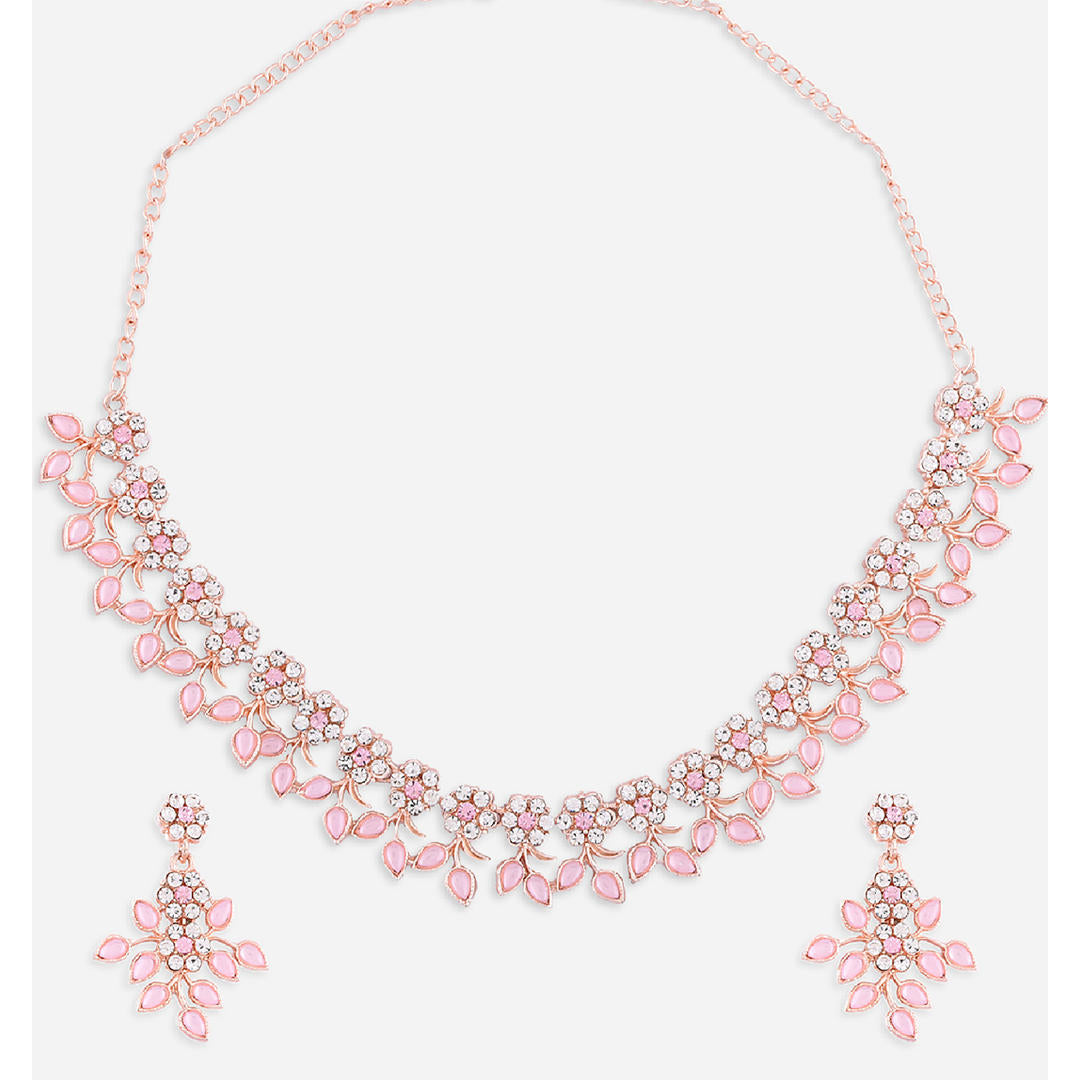rose gold plated floral jewellery set with a necklace and earrings, featuring pink stones closeup
