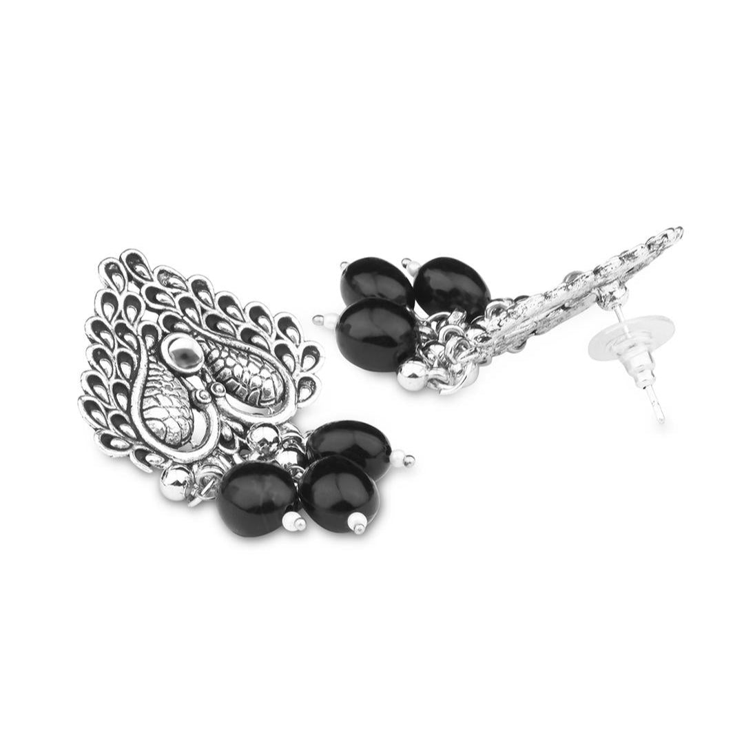 a silver-plated oxidised black beaded pair of peacock earrings.