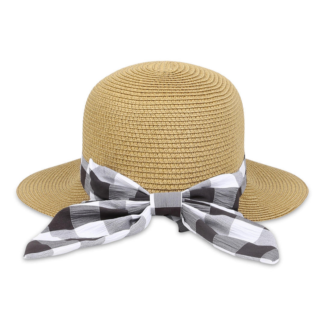 A beige beach hat with a black-and-white checked scarf tied around the base.