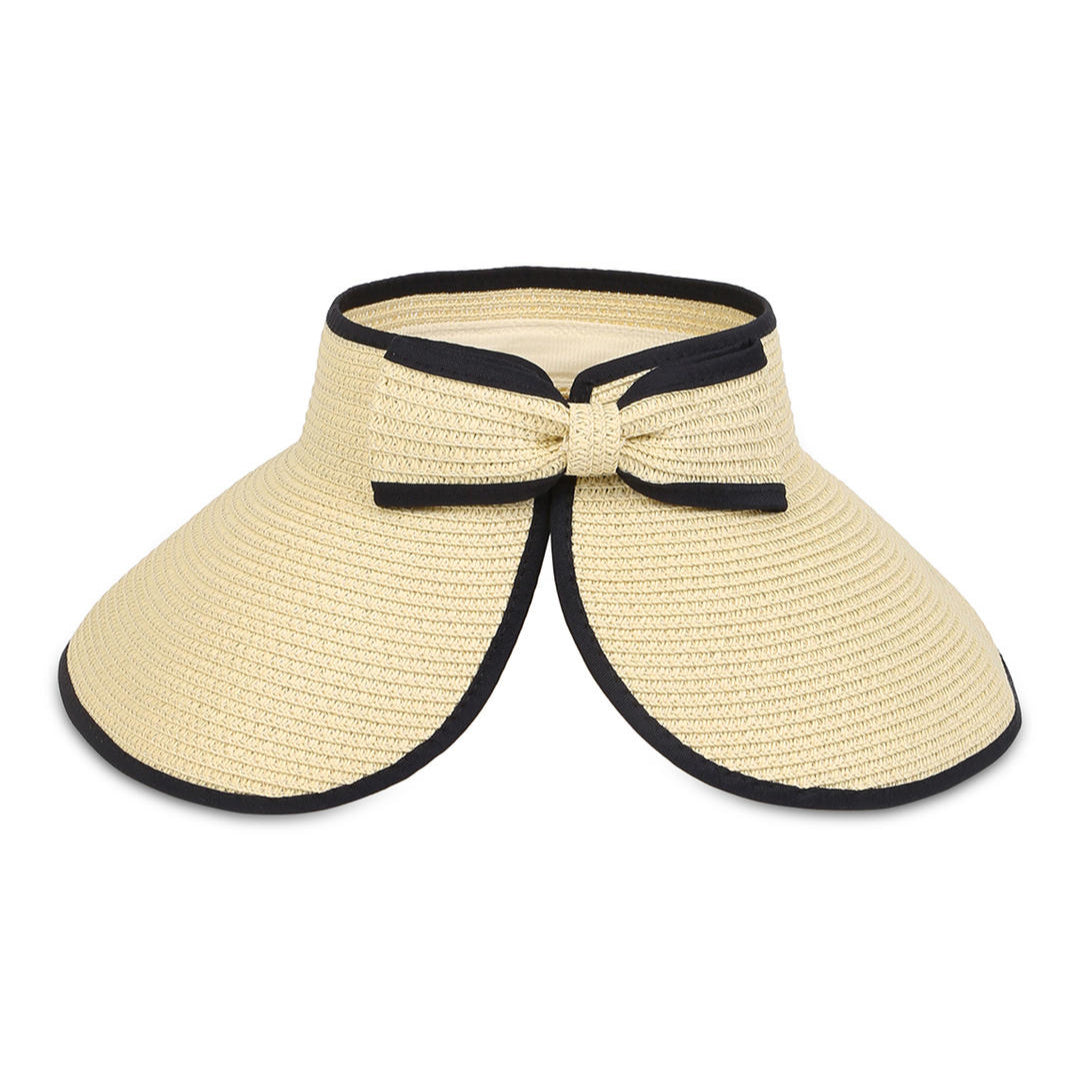 A beige sun visor with black edging and a bow at the back.