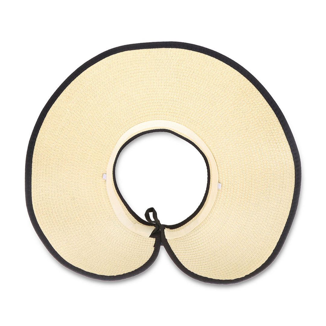 A beige sun visor with black edging and a bow at the back.