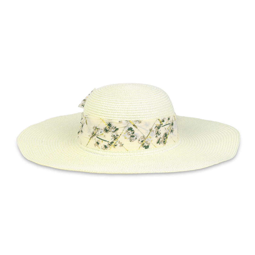 A white beach hat with an ivory floral scarf tied around the brim.