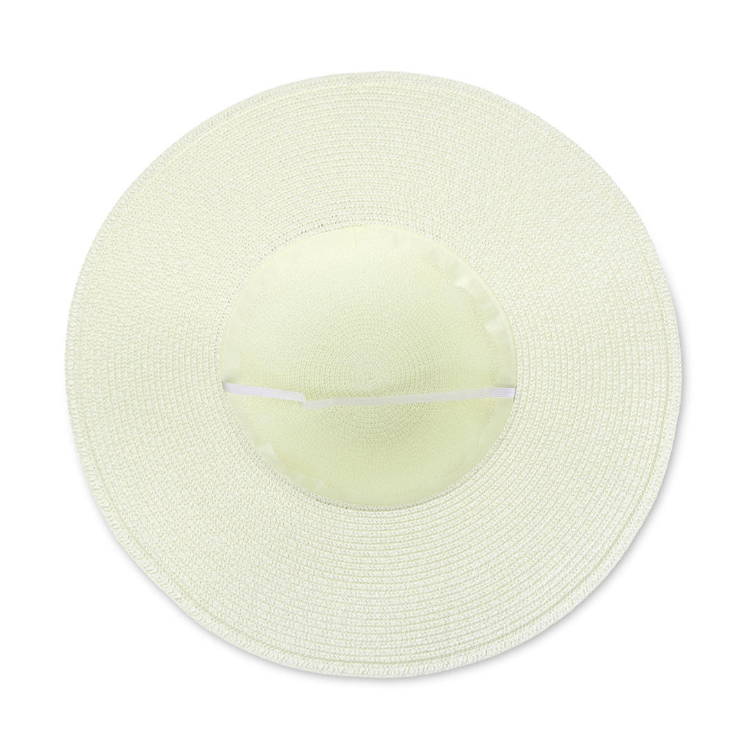 A white beach hat with a tan scarf tied around the base, made from woven straw material.