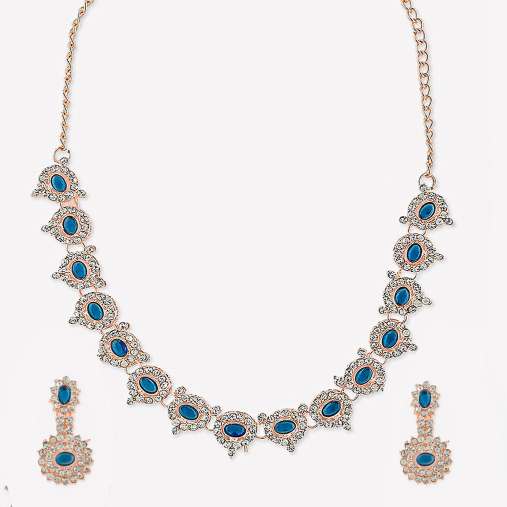 a luxurious sapphire blue floral wedding jewellery set, including a matching necklace and earrings.