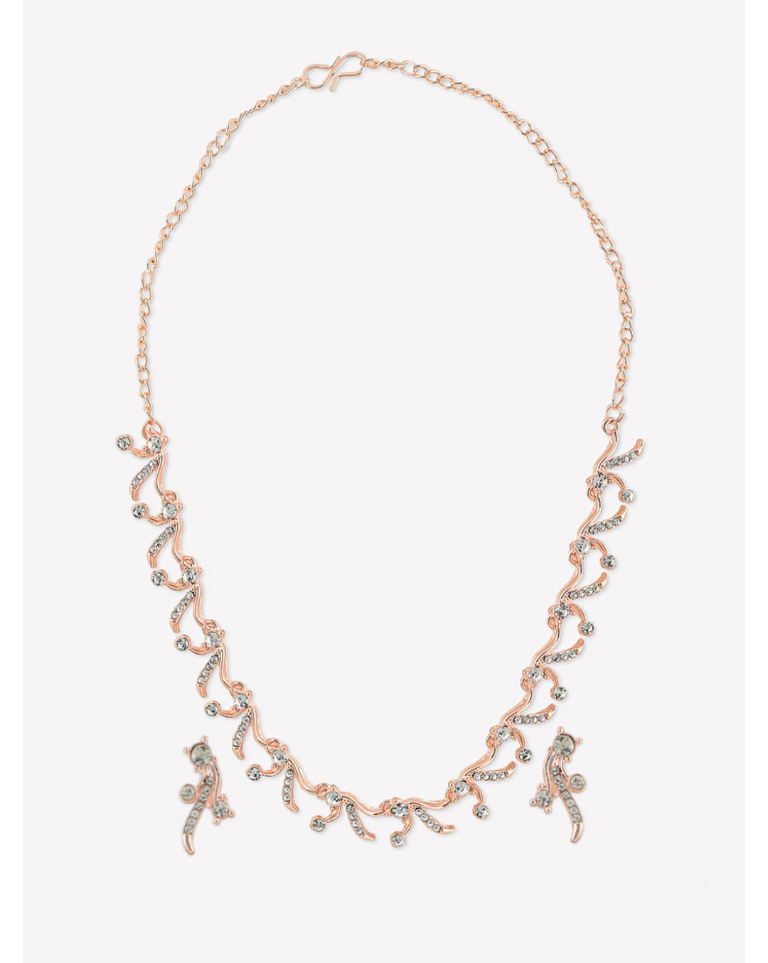 a rose gold floral party necklace and earrings set with sparkling stones.
