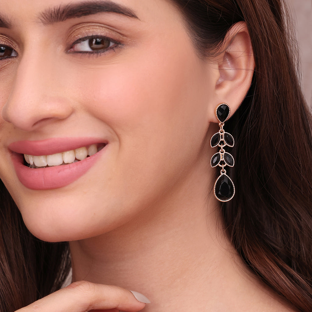 Golden Dangle Earrings with Black Teardrop Stones