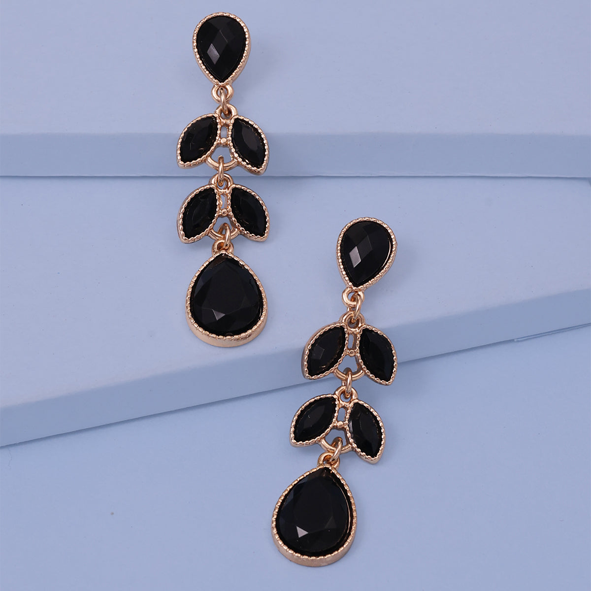 Golden Dangle Earrings with Black Teardrop Stones