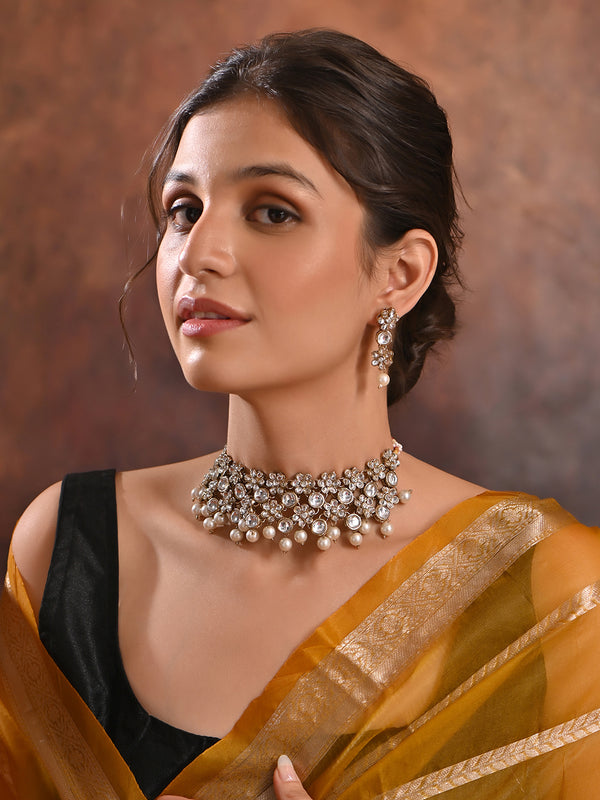 Gold-toned kundan floral choker necklace set with pearl bead drops and matching earrings – traditional wedding jewellery
