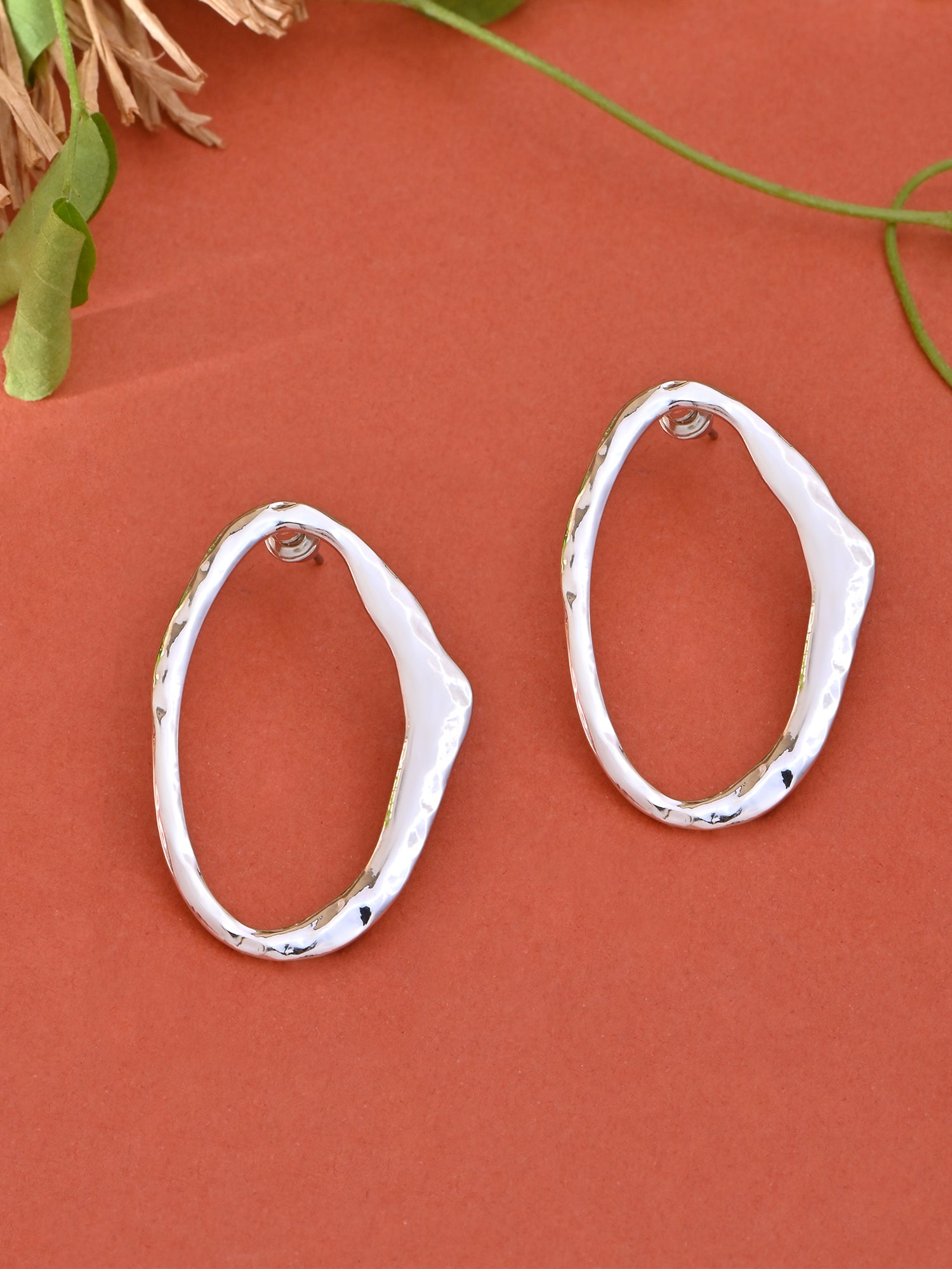 Gleaming Oval Silver Stud Earrings