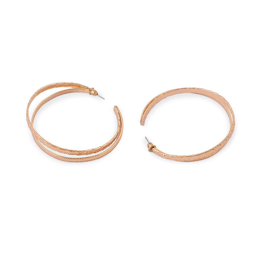 Rose gold hoop earrings on a white background. ToniQ jewellery is skin safe, nickel free, cadmium free, hypoallergenic, and lab tested for your comfort and trust.