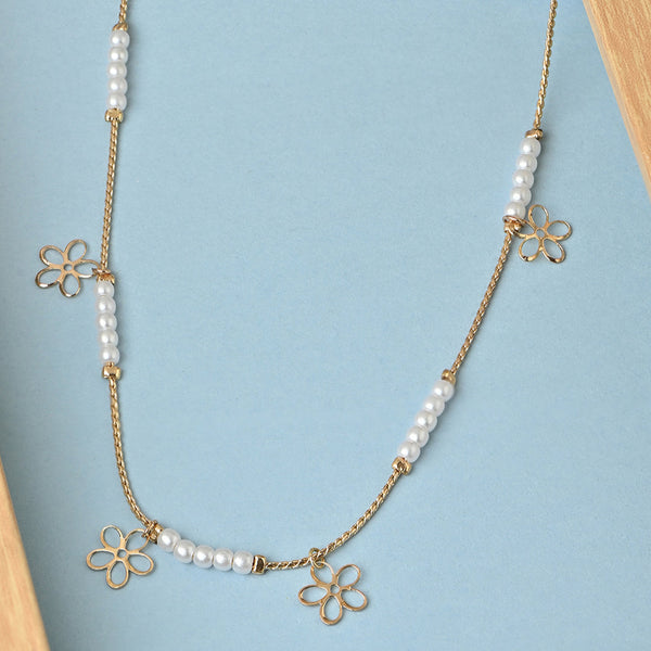 Gold floral charm and white beaded delicate necklace