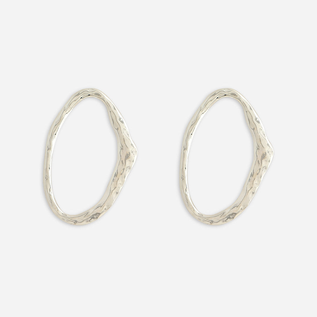 A pair of silver-plated oval-shaped stud earrings with a polished finish.