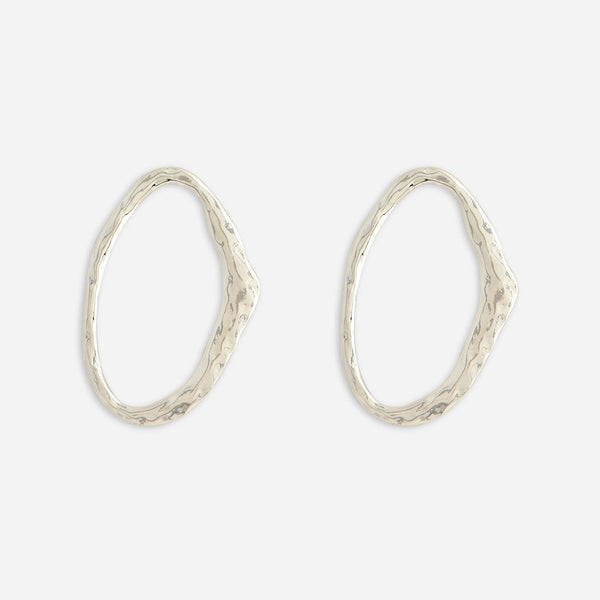A pair of silver-plated oval-shaped stud earrings with a polished finish.
