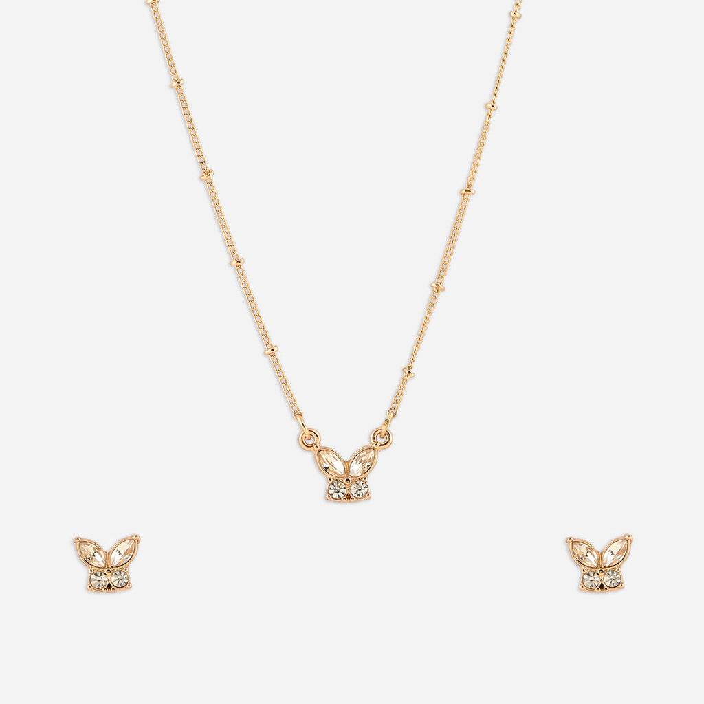Gold butterfly necklace and earrings on a white background