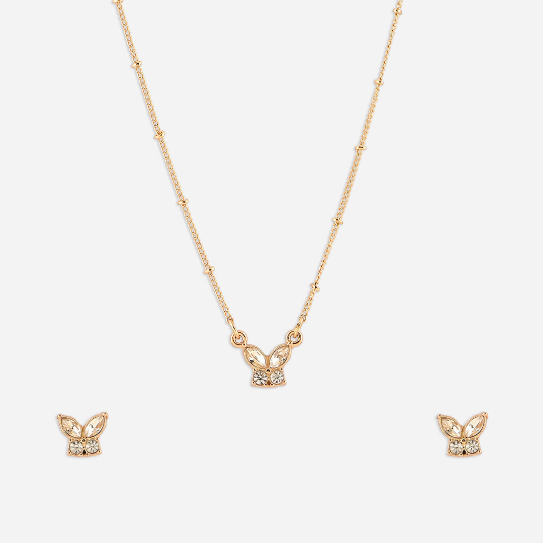 Gold butterfly necklace and earrings on a white background
