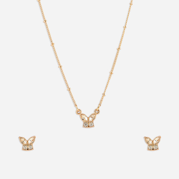 Gold butterfly necklace and earrings on a white background