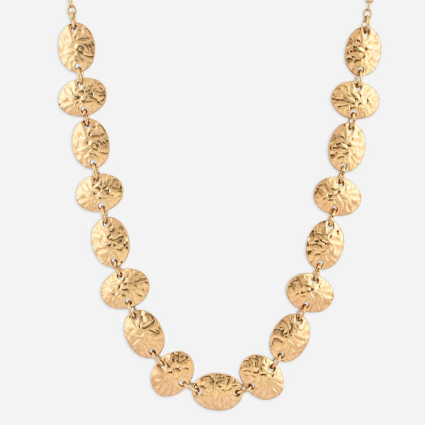 Gold necklace with round pendants on a white background