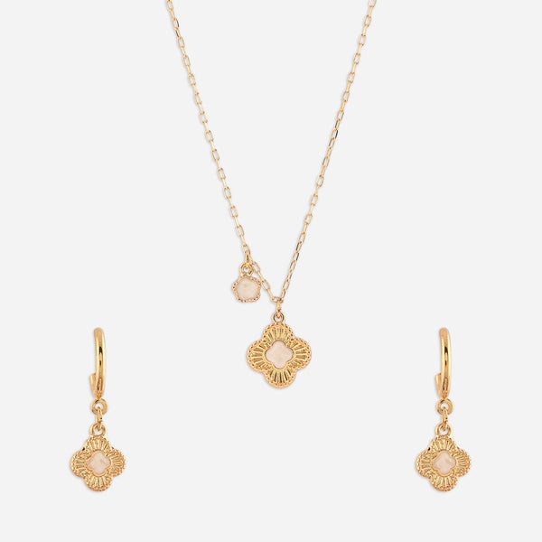 Gold jewelry set with necklace, earrings, and pendant on a white background