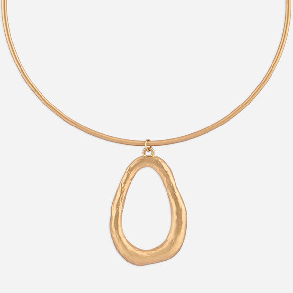 Gold necklace with a unique pendant on a white background
