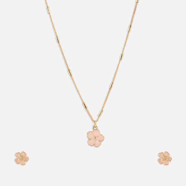 Gold necklace with a pink flower pendant on a white background