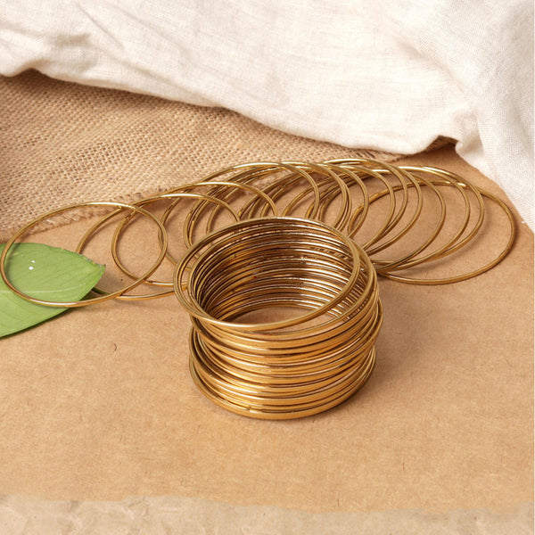 Fida set of 18 gold-plated metal bangles for women—sleek traditional Indian jewellery stack