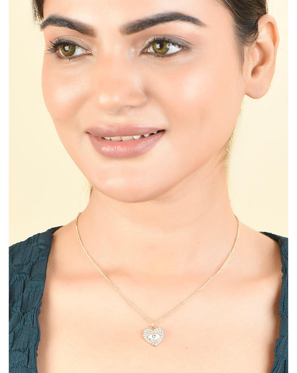 A woman wearing a blue gold plated necklace with an evil eye design embellished with dazzling CZ stones.