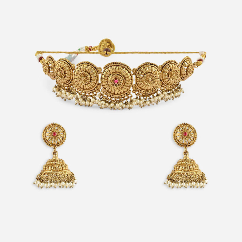 mehendi gold temple necklace and earrings set with intricate designs and pearl accents on white background