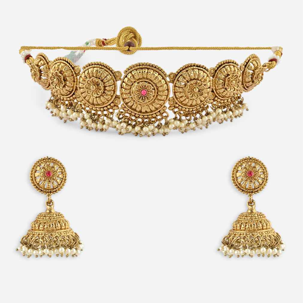 mehendi gold temple necklace and earrings set with intricate designs and pearl accents close-up