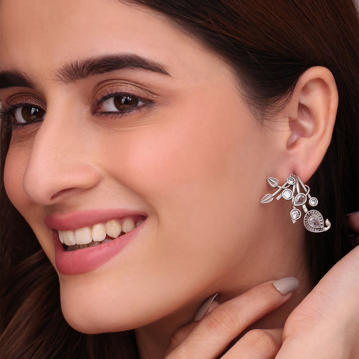 Intricate Oxidized Silver Stud Earrings with American Diamond Accents