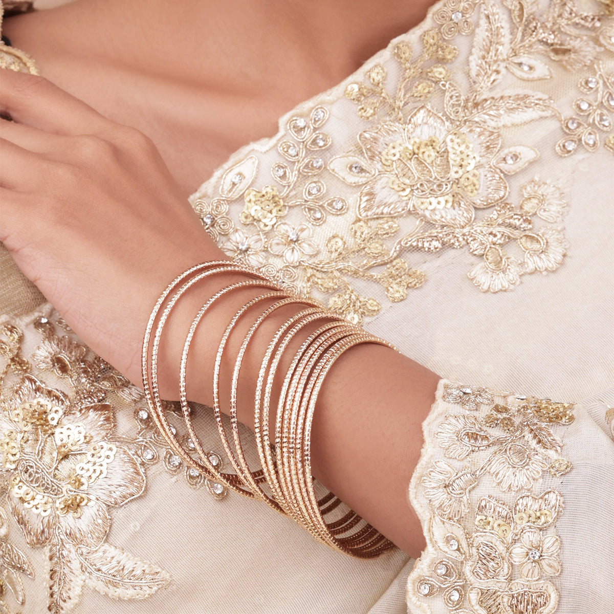 High-Shine Golden Textured Set of 12 Slip-On Bangles (2.8)