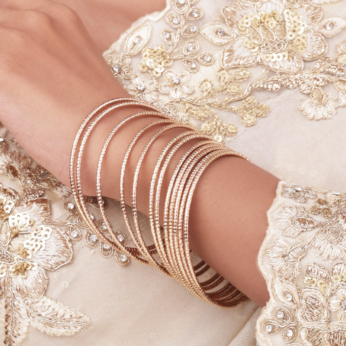 High-Shine Golden Textured Set of 12 Slip-On Bangles (2.8)