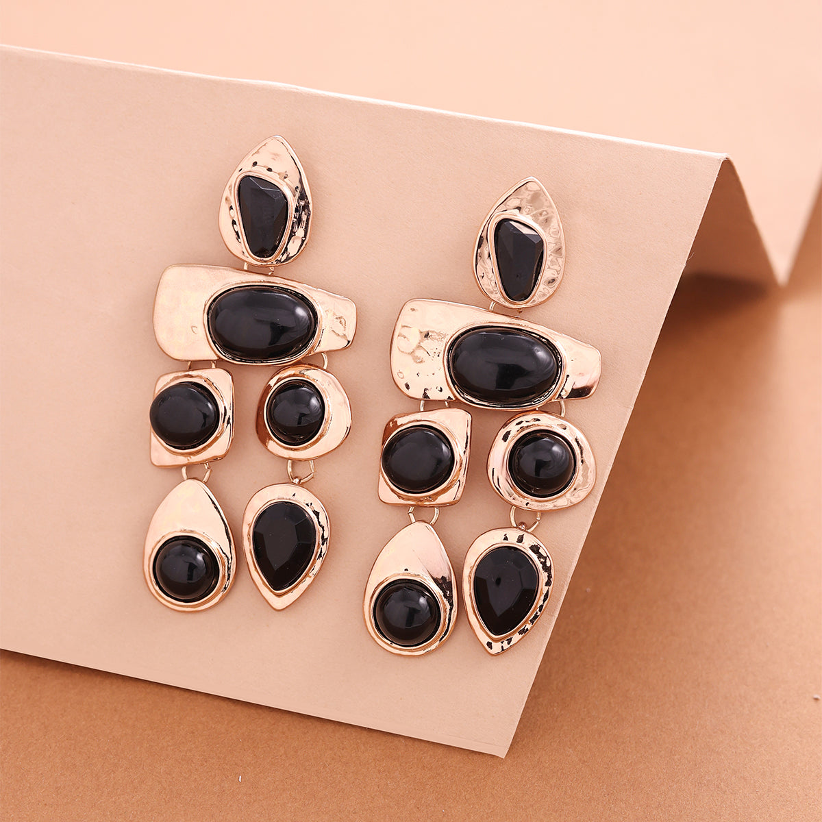 Chunky Golden Geometric Drop Earrings with Black Cabochons