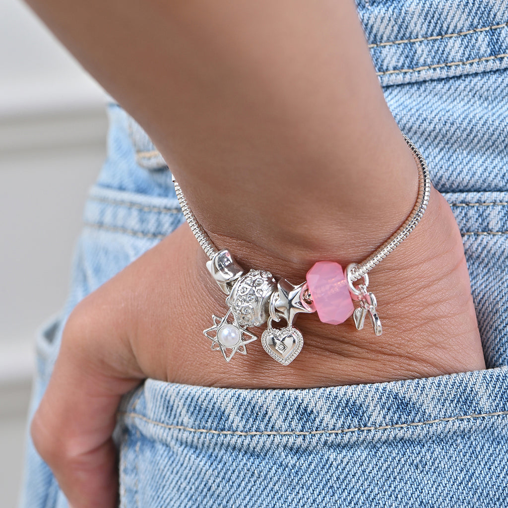 Silver-Toned Minimal Multi Charm Bracelet with Pink Bead