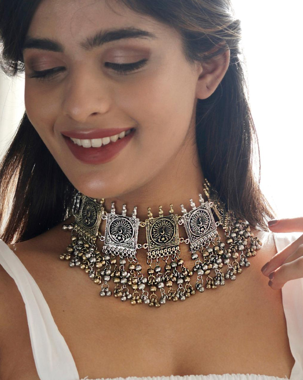 Dual Metal Ghungroo Choker Necklace with gold and silver tones, and ghungroo accents.