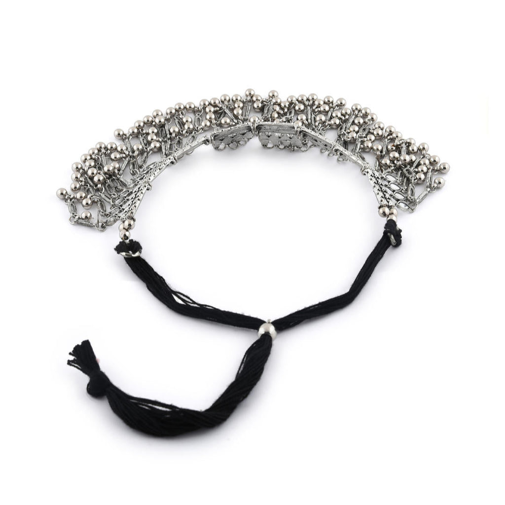 silver oxidised bell-like choker necklace with a mirrored design side view