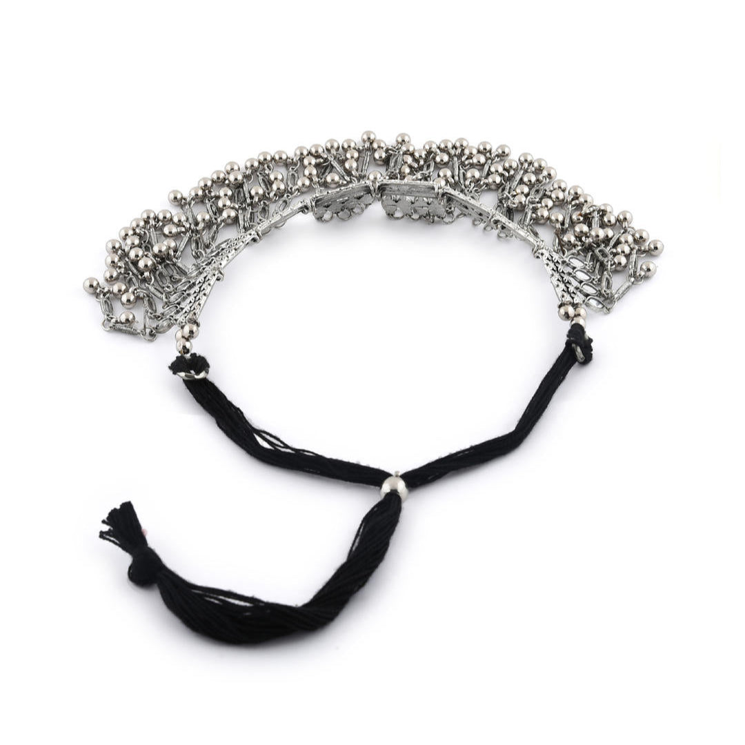silver oxidised bell-like choker necklace with a mirrored design side view