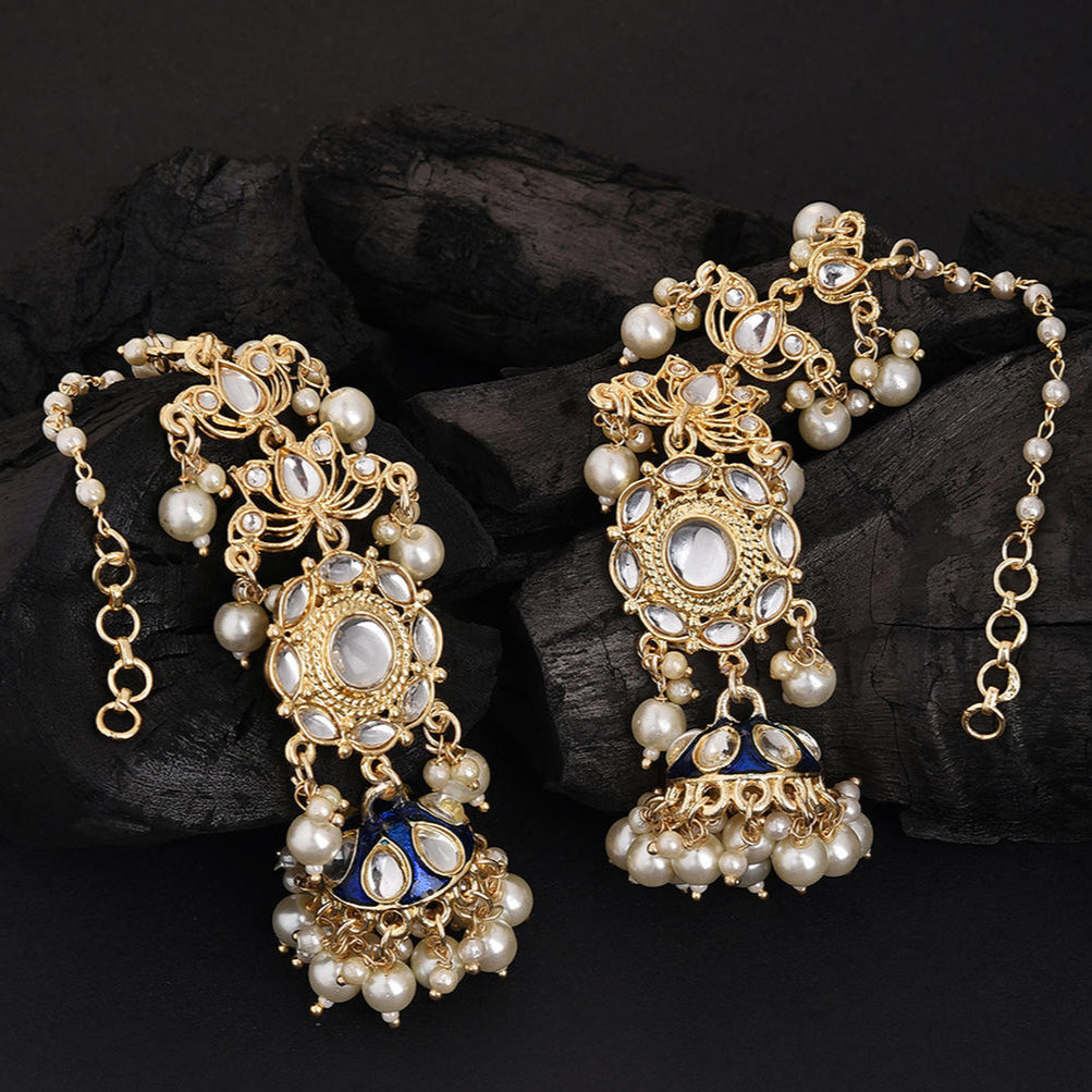 A pair of gold-plated blue enamelled floral jhumka earrings with pearl accents.