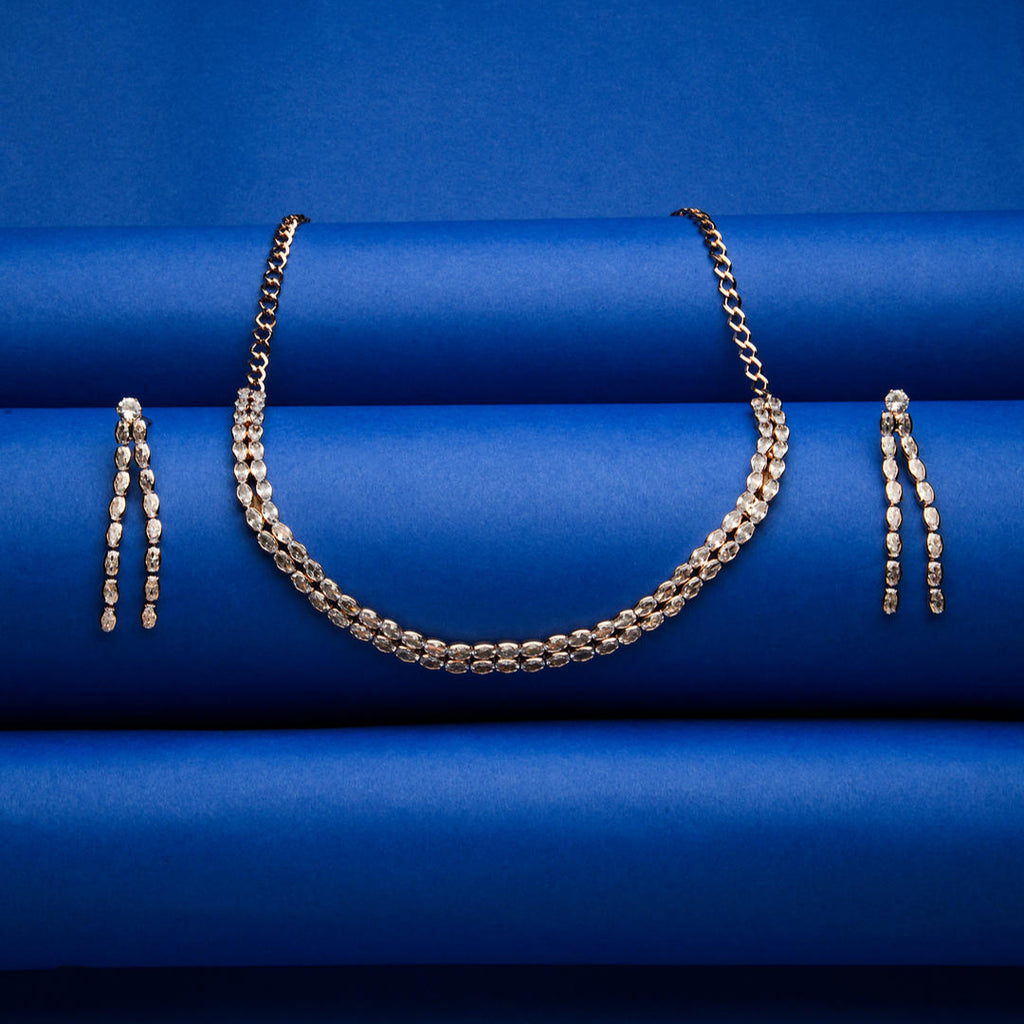 a rose gold plated double layered jewellery set with a necklace and earrings.