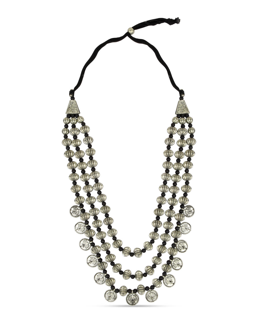 multilayered silver coin necklace on white background