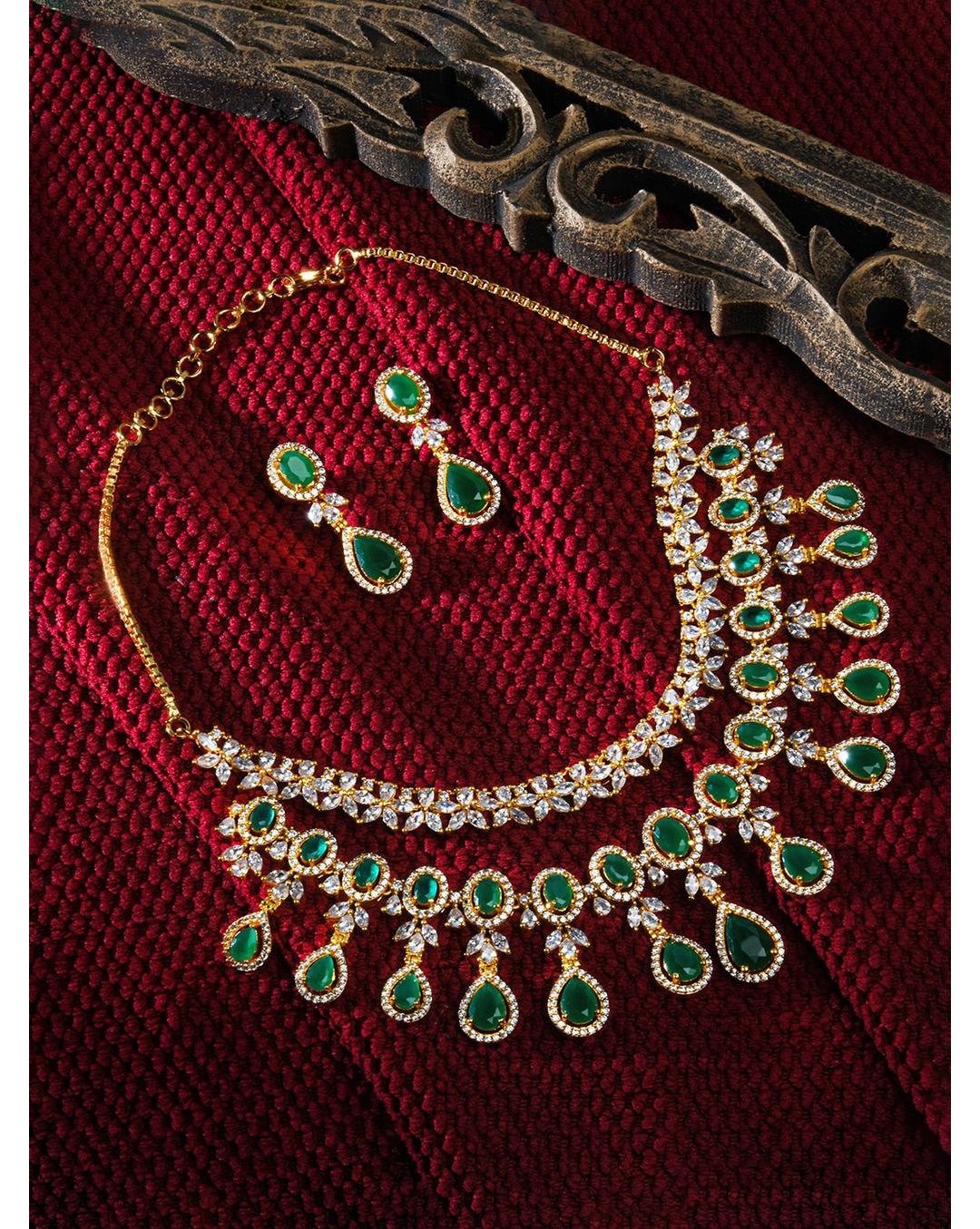 Fida Luxurious American Diamond and Green Stone Layered Jewellery Set with necklace and earrings, handcrafted bridal wedding jewellery
