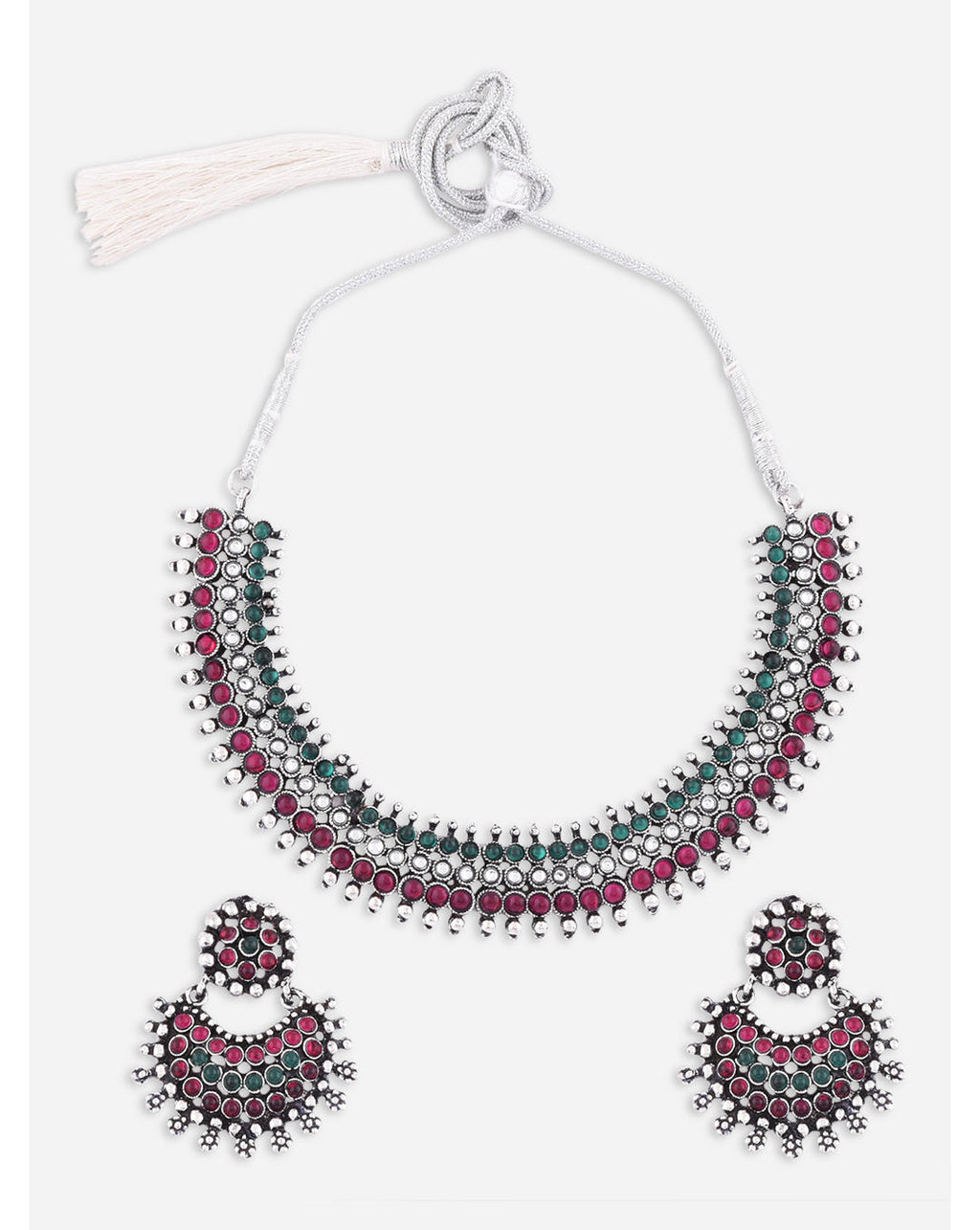 A South Indian traditional silver choker necklace and earrings set with marron and kundan embellishments.