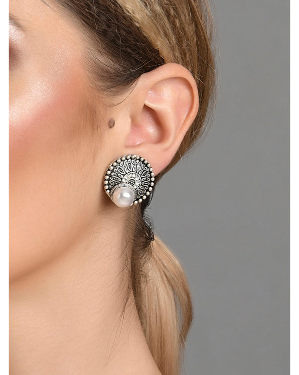 A pair of oxidised silver-plated round stud earrings with pearl detail, designed for women