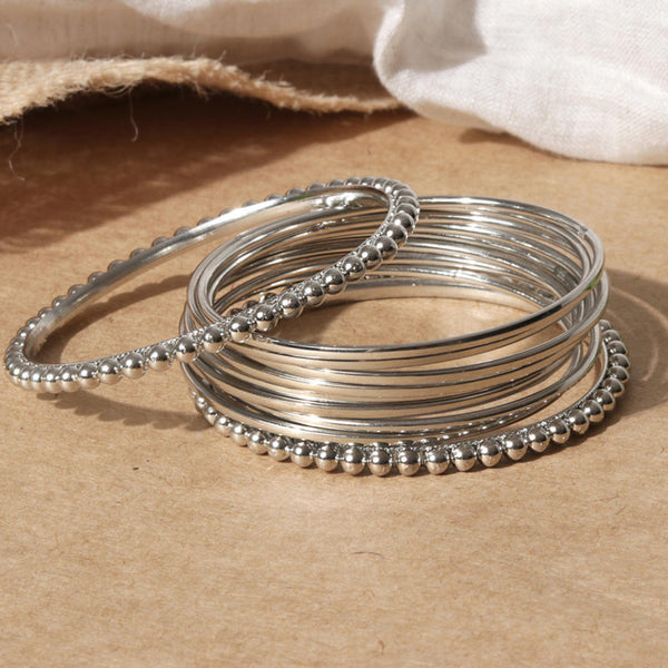 Set of 10 silver-plated metal bangles with beaded detailing – elegant traditional jewellery for women